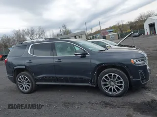 2021 GMC Acadia Denali z VIN 1GKKNXLS8MZ133935, wystawiony jako IAAI lot #42059767 z przebiegiem 72 414 mil mil oraz . Historia ofert i sprzedaży dostępna na DreamBid. Obrazek 13.