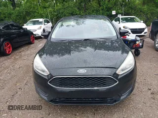 2017 Ford Focus SE with VIN 1FADP3F26HL276139, listed as a IAAI auction lot 42316774 with 165,227 mi miles and . Bid and sale history available at DreamBid. Image 6.