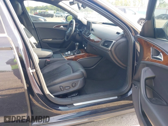 2015 Audi A6 3.0T Prestige with VIN WAUHGAFC3FN011654, listed as a IAAI auction lot 42104153 with 166,719 mi miles. Bid and sale history available at carsss.com. Image 5.