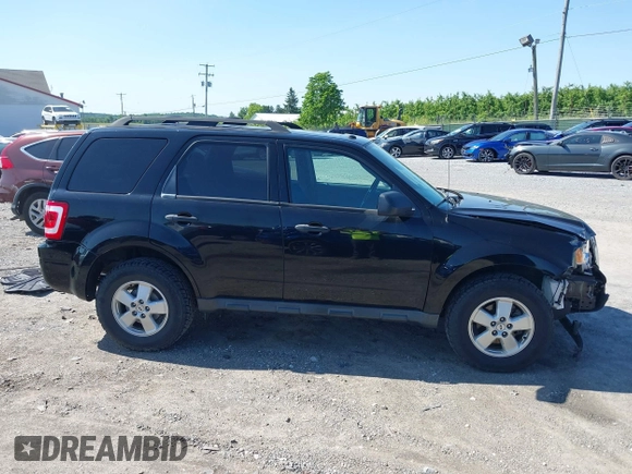 2012 Ford Escape XLT z VIN 1FMCU9D76CKC59030, wystawiony jako IAAI lot #42396412 z przebiegiem 101 223 mil mil oraz . Historia ofert i sprzedaży dostępna na DreamBid. Obrazek 13.