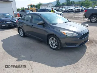 2017 Ford Focus SE z VIN 1FADP3F21HL213532, wystawiony jako IAAI lot #42680885 z przebiegiem 77 930 mil mil oraz . Historia ofert i sprzedaży dostępna na DreamBid. Obrazek 1.