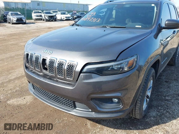 2019 Jeep Cherokee Latitude Plus with VIN 1C4PJMLBXKD162570, listed as a IAAI auction lot 41897313 with 142,110 mi miles. Bid and sale history available at carsss.com. Image 6.