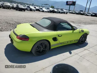1999 Porsche Boxster with VIN WP0CA2987XU622760, listed as a Copart auction lot 59898355 with 104,425 mi miles and Salvage title. Bid and sale history available at DreamBid. Image 3.