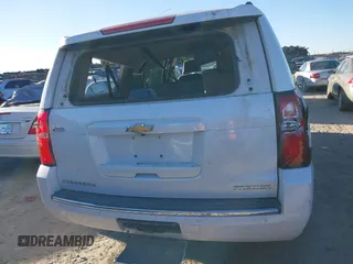 2019 Chevrolet Suburban Premier with VIN 1GNSCJKC0KR293658, listed as a IAAI auction lot 40563834 with 153,619 mi miles. Bid and sale history available at carsss.com. Image 16.