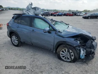 2023 Toyota Corolla Cross LE with VIN 7MUCAABG8PV066528, listed as a Copart auction lot 58902095 with 14,190 mi miles and Salvage title. Bid and sale history available at DreamBid. Image 4.