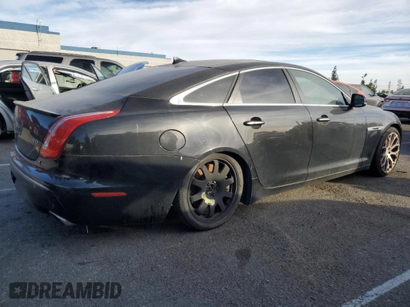 2015 Jaguar XJ with VIN SAJWA3HT2FMV89272, listed as a Copart auction lot 42195005 with 131,456 mi miles and Clean Title. Bid and sale history available at DreamBid. Image 3.