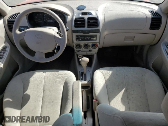 2005 Hyundai Accent GLS with VIN KMHCG45C55U593854, listed as a Copart auction lot 72237914 with 83,203 mi miles and Clean Title. Bid and sale history available at carsss.com. Image 8.