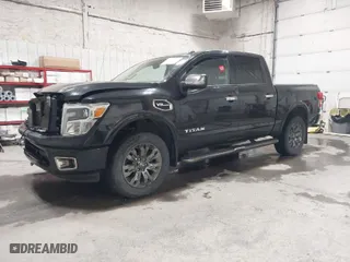 2017 Nissan Titan SV with VIN 1N6AA1E58HN502777, listed as a IAAI auction lot 41612504 with 142,920 mi miles. Bid and sale history available at carsss.com. Image 2.