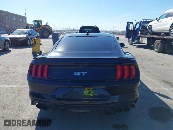 2021 Ford Mustang GT z VIN 1FA6P8CF6M5149175, wystawiony jako IAAI lot #41798328 z przebiegiem 61 776 mil mil oraz . Historia ofert i sprzedaży dostępna na DreamBid. Obrazek 16.