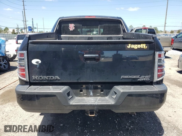 2014 Honda Ridgeline Sport with VIN 5FPYK1F73EB007015, listed as a Copart auction lot 55148465 with 131,148 mi miles and Salvage title. Bid and sale history available at DreamBid. Image 6.