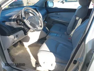 2006 Lexus RX 400h with VIN JTJHW31U560026104, listed as a IAAI auction lot 41311951 with 246,861 mi miles and . Bid and sale history available at DreamBid. Image 5.
