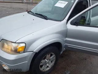 2005 Ford Escape Limited with VIN 1FMYU04115KD53431, listed as a IAAI auction lot 41183221 with 1 mi miles. Bid and sale history available at carsss.com. Image 6.