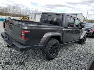 2023 Jeep Gladiator Sport S with VIN 1C6HJTAG9PL572388, listed as a Copart auction lot 53346475 with 11,081 mi miles and Salvage title. Bid and sale history available at DreamBid. Image 3.