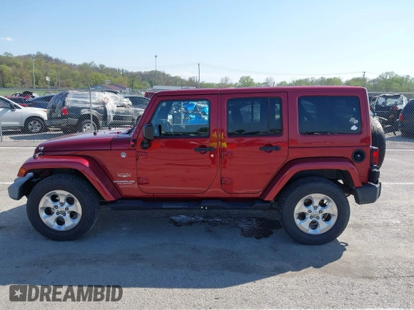 2013 Jeep Wrangler Unlimited Sahara с VIN 1C4BJWEG5DL569977, выставлен на аукционе IAAI как лот 41980394 с пробегом 145 571 миль миль и . История ставок и продаж доступна на DreamBid. Изображение 14.