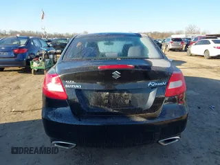 2010 Suzuki Kizashi SE with VIN JS2RE9A34A6100807, listed as a IAAI auction lot 41690974 with 122,419 mi miles and . Bid and sale history available at DreamBid. Image 16.