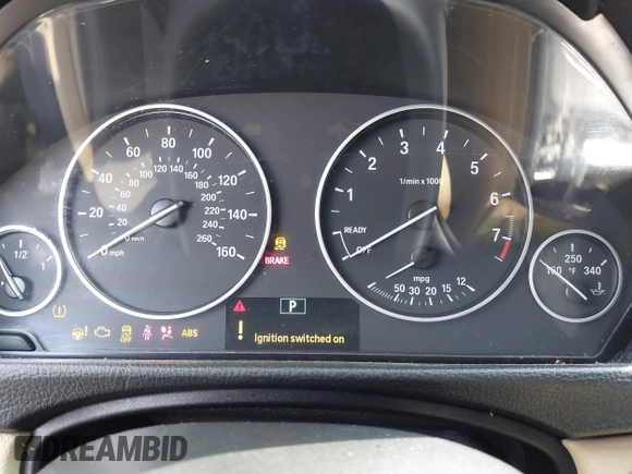 2014 BMW 3 Series 320i with VIN WBA3B1C56EK131849, listed as a IAAI auction lot 42018005 with 215,765 mi miles. Bid and sale history available at carsss.com. Image 7.