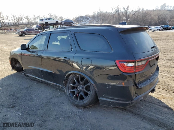 2023 Dodge Durango R/T Plus with VIN 1C4SDJCT3PC584041, listed as a Copart auction lot 42699595 with 20,357 mi miles and Salvage Title. Bid and sale history available at carsss.com. Image 2.