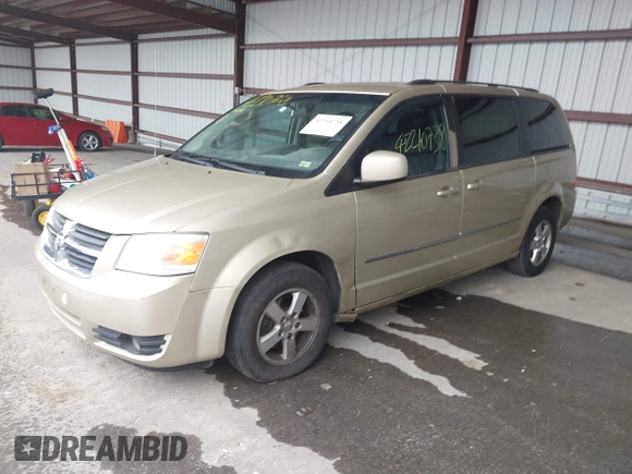 2010 Dodge Grand Caravan SXT with VIN 2D4RN5D17AR496854, listed as a IAAI auction lot 42210738 with 213,121 mi miles and . Bid and sale history available at DreamBid. Image 2.
