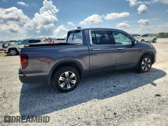 2017 Honda Ridgeline RTL-E with VIN 5FPYK3F79HB031142, listed as a Copart auction lot 62365885 with 134,517 mi miles and Salvage title. Bid and sale history available at DreamBid. Image 3.