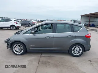 2013 Ford C-Max SEL z VIN 1FADP5BUXDL526768, wystawiony jako IAAI lot #42357018 z przebiegiem 149 659 mil mil oraz . Historia ofert i sprzedaży dostępna na DreamBid. Obrazek 15.