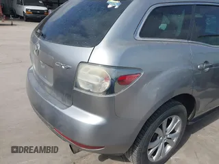 2010 Mazda CX-7 Touring z VIN JM3ER2W30A0319755, wystawiony jako IAAI lot #41786798 z przebiegiem 182 282 mil mil oraz . Historia ofert i sprzedaży dostępna na DreamBid. Obrazek 14.