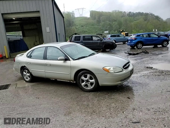 2003 Ford Taurus SE Standard z VIN 1FAFP532X3A195612, wystawiony jako Copart lot #54016645 z przebiegiem 143 168 mil mil oraz Szkoda całkowita • Salvage title. Historia ofert i sprzedaży dostępna na DreamBid. Obrazek 13.
