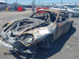 2003 Porsche 911 z VIN WP0AA29933S623295, wystawiony jako IAAI lot #41885965 z przebiegiem Nie podano mil oraz . Historia ofert i sprzedaży dostępna na DreamBid. Obrazek 2.