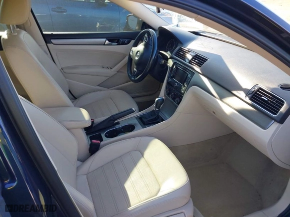 2015 Volkswagen Passat 1.8T SE w/Sunroof & Nav with VIN 1VWBT7A30FC010548, listed as a IAAI auction lot 41363214 with 80,284 mi miles. Bid and sale history available at carsss.com. Image 5.