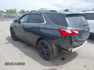 2021 Chevrolet Equinox LT with VIN 3GNAXUEVXML341465, listed as a IAAI auction lot 42027654 with 126,932 mi miles and . Bid and sale history available at DreamBid. Image 3.