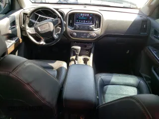 2017 GMC Canyon 4WD Denali with VIN 1GTP6EE11H1296082, listed as a Copart auction lot 65597584 with 89,113 mi miles and Salvage Title. Bid and sale history available at carsss.com. Image 8.