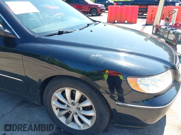 2007 Hyundai Azera SE with VIN KMHFC46F47A172875, listed as a IAAI auction lot 42632253 with 218,536 mi miles and . Bid and sale history available at DreamBid. Image 12.
