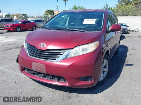 2012 Toyota Sienna LE AAS with VIN 5TDKK3DC6CS234136, listed as a IAAI auction lot 42064491 with 103,925 mi miles. Bid and sale history available at carsss.com. Image 2.