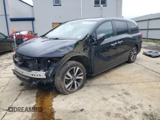 2021 Honda Odyssey Touring с VIN 5FNRL6H88MB001125, выставлен на аукционе Copart как лот 57171345 с пробегом 60 802 миль миль и Списание • Salvage title. История ставок и продаж доступна на DreamBid. Изображение 1.
