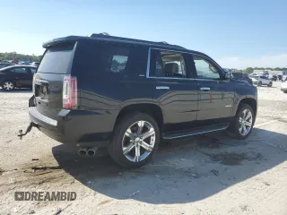 2018 GMC Yukon SLT with VIN 1GKS1BKC9JR108210, listed as a Copart auction lot 50465765 with 106,542 mi miles and Salvage Title. Bid and sale history available at carsss.com. Image 3.