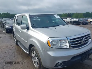 2015 Honda Pilot EX-L with VIN 5FNYF4H5XFB014653, listed as a IAAI auction lot 42121003 with 152,912 mi miles and . Bid and sale history available at carsss.com. Image 1.