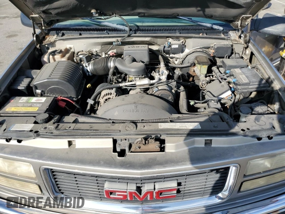1999 GMC Suburban with VIN 3GKEC16R0XG526194, listed as a Copart auction lot 83740634 with 199,583 mi miles and Clean title. Bid and sale history available at DreamBid. Image 11.