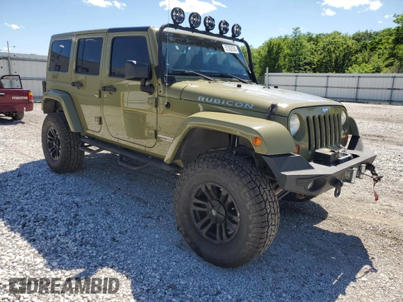 2013 Jeep Wrangler Unlimited Rubicon with VIN 1C4BJWFG0DL587057, listed as a Copart auction lot 57362535 with 102,684 mi miles and Salvage title. Bid and sale history available at DreamBid. Image 4.