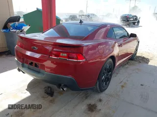 2014 Chevrolet Camaro LS z VIN 2G1FA1E32E9147104, wystawiony jako IAAI lot #42324064 z przebiegiem 70 585 mil mil oraz . Historia ofert i sprzedaży dostępna na DreamBid. Obrazek 4.