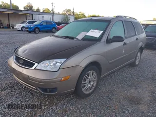 2005 Ford Focus SE with VIN 1FAFP36N15W304216, listed as a IAAI auction lot 41950778 with 241,997 mi miles and . Bid and sale history available at carsss.com. Image 2.