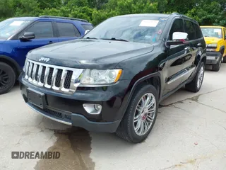 2013 Jeep Grand Cherokee Overland with VIN 1C4RJECT2DC588124, listed as a IAAI auction lot 42142573 with 204,309 mi miles and . Bid and sale history available at DreamBid. Image 17.