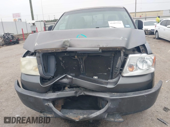 2006 Ford F-150 STX with VIN 1FTRX02WX6KB71470, listed as a IAAI auction lot 41402316 with 168,323 mi miles and . Bid and sale history available at DreamBid. Image 12.