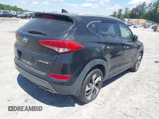 2016 Hyundai Tucson Limited with VIN KM8J33A2XGU195973, listed as a IAAI auction lot 42198560 with 111,181 mi miles. Bid and sale history available at carsss.com. Image 4.
