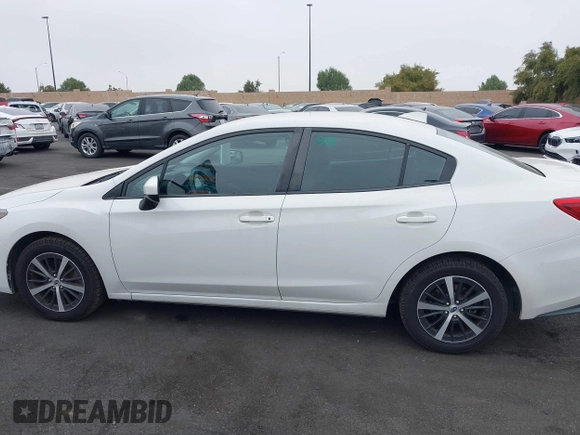 2021 Subaru Impreza Premium with VIN 4S3GKAV61M3604298, listed as a IAAI auction lot 42011198 with 50,667 mi miles and . Bid and sale history available at DreamBid. Image 15.