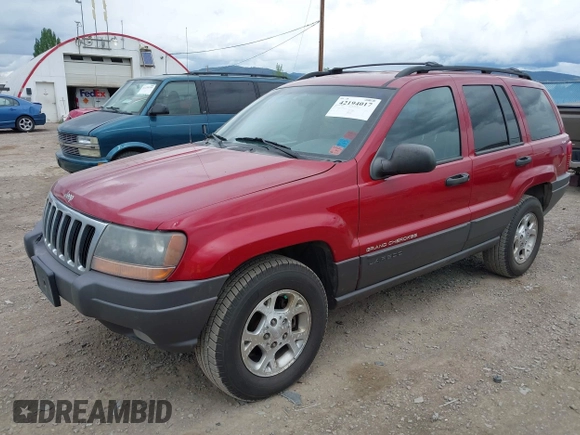 2001 Jeep Grand Cherokee Laredo with VIN 1J4GW48N51C732011, listed as a IAAI auction lot 42194017 with 195,716 mi miles and . Bid and sale history available at DreamBid. Image 2.