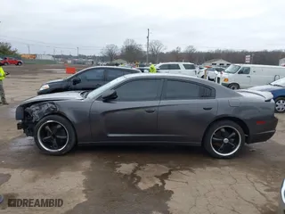 2014 Dodge Charger SE with VIN 2C3CDXBG8EH357664, listed as a IAAI auction lot 41860609 with 94,918 mi miles. Bid and sale history available at carsss.com. Image 14.