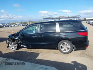 2019 Honda Odyssey EX with VIN 5FNRL6H54KB036540, listed as a IAAI auction lot 42124939 with 135,417 mi miles. Bid and sale history available at carsss.com. Image 15.