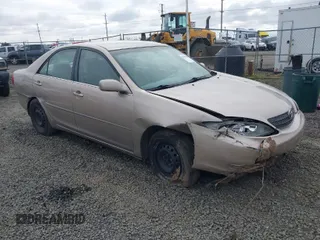 2002 Toyota Camry LE z VIN 4T1BE32K72U028489, wystawiony jako IAAI lot #41760604 z przebiegiem 163 950 mil mil oraz . Historia ofert i sprzedaży dostępna na DreamBid. Obrazek 1.