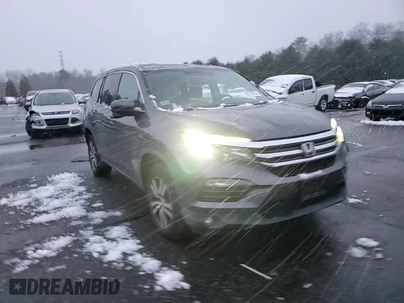 2017 Honda Pilot EX-L with VIN 5FNYF6H54HB008054, listed as a Copart auction lot 82758704 with 124,024 mi miles and Salvage Title. Bid and sale history available at DreamBid. Image 12.