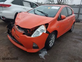 2013 Toyota Prius c One with VIN JTDKDTB35D1042976, listed as a IAAI auction lot 41535756 with 173,054 mi miles. Bid and sale history available at carsss.com. Image 2.