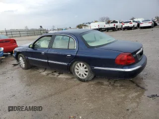 2002 Lincoln Continental with VIN 1LNHM97V22Y682098, listed as a Copart auction lot 77821624 with 0 mi miles and Salvage Title. Bid and sale history available at carsss.com. Image 2.